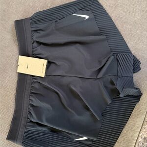 Nike Black Women's Pleated Athletic Shorts with White Swoosh